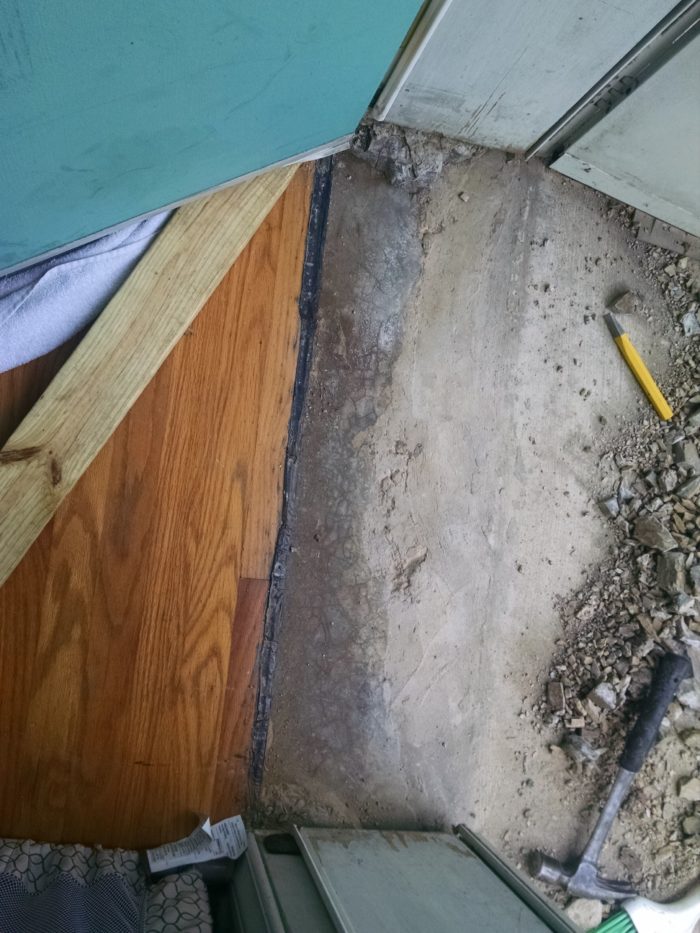 How to repair the concrete sill under our front door